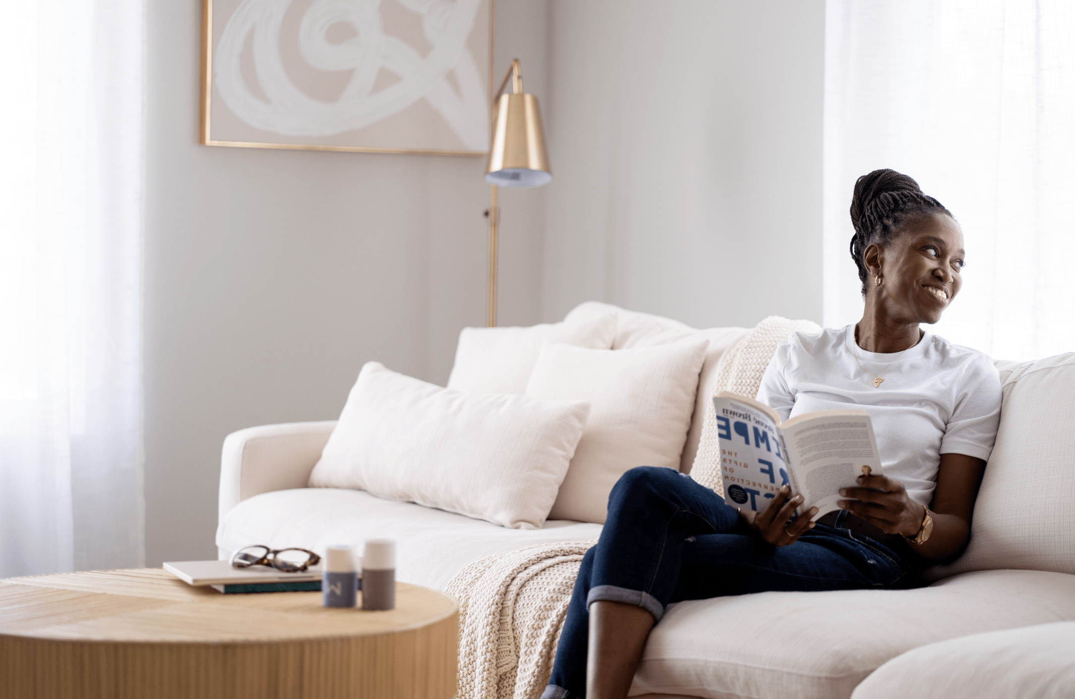 Woman reading on sofa