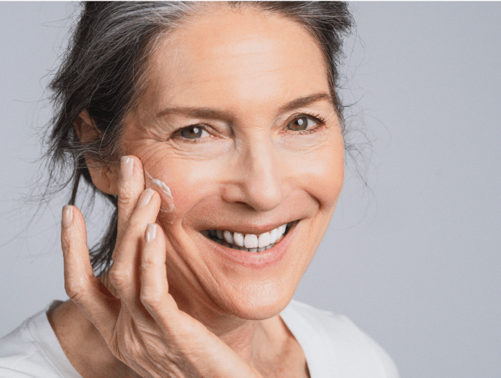 Woman applying cream